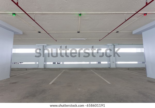 Parking garage interior, industrial\
building,empty space car park\
interior