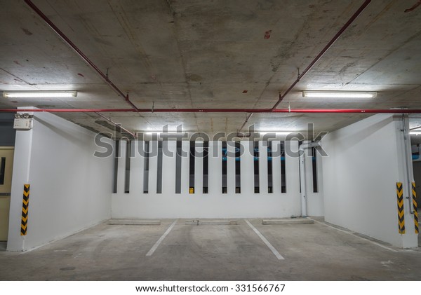 Parking garage\
interior neon lights in\
dark