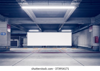 Parking Garage Underground Interior With Blank Billboard