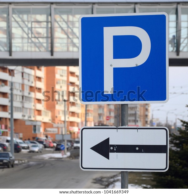 Parking left. Traffic sign with the letter P and the\
arrows to the left