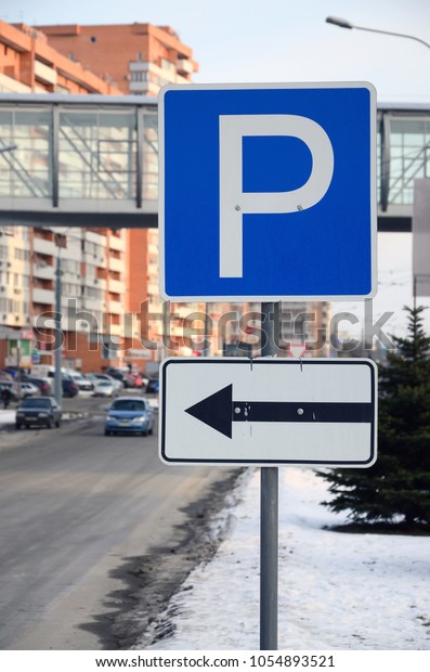 Parking left. Traffic sign with the letter P and the\
arrows to the left