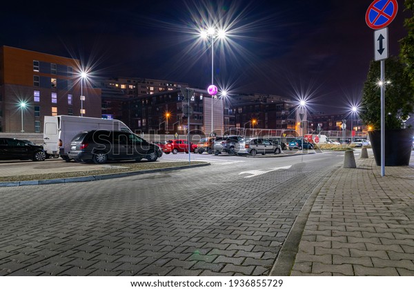 Parking\
lot. Car lot parking space in underground city garage. Empty road\
asphalt background. Ground floor for car\
parking
