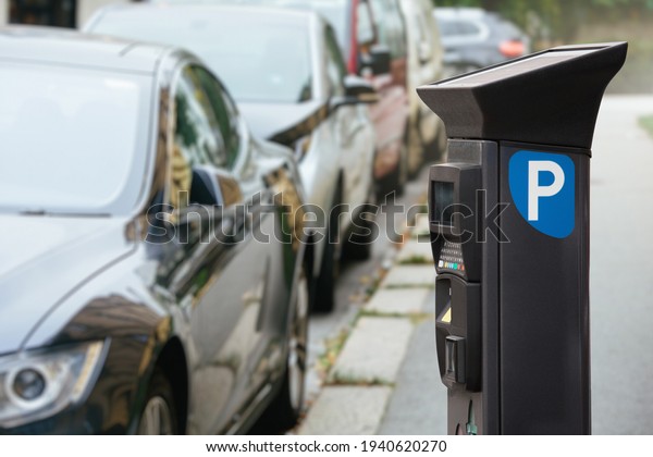 Parking machine with solar panel in the city
street. Pay On Foot Parking
System