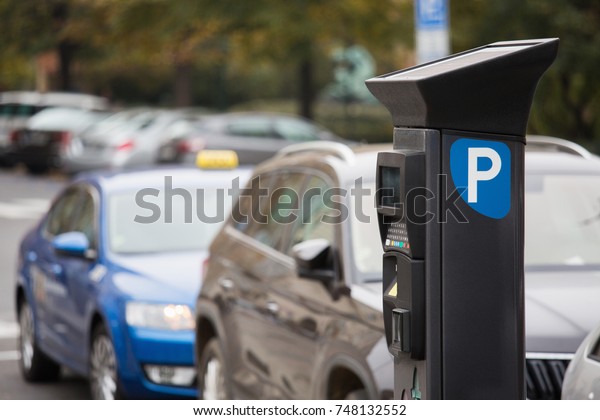 Parking machine with solar panel in the city\
street. Pay On Foot Parking\
System