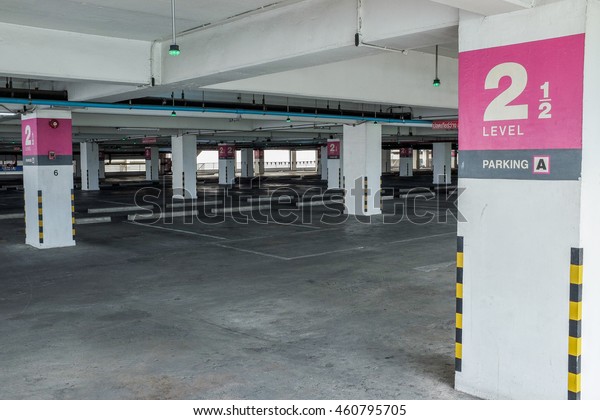 Parking lot in mall dingy\
light.\
