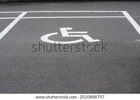 Parking lot mark for the disabled