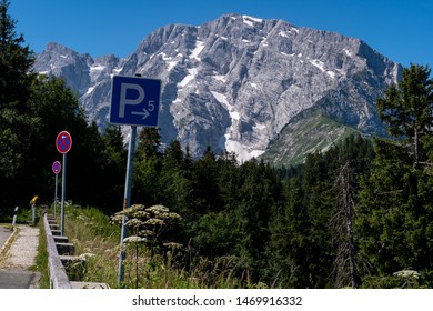 Parking lot with mountain view at Rossfeld Panorama Strasse Alpine pass road in Berchtesgaden National Park in Bavaria, Germany Europe in the summer of 2019 - Shutterstock ID 1469916332