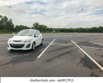 Parking Lot With One Car