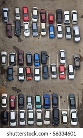 Parking with parked cars. Aerial view from a height.
