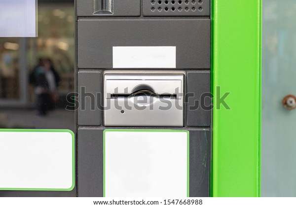 Parking payment terminal, device on a city street\
for digital pay.