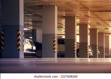 Parking in a residential building. Covered underground parking for cars