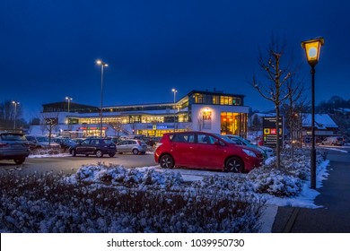 Parking Lot And Shopping Mall In Winter At Night, Tutzing, Bavaria, Germany, Europe, 08. February 2018