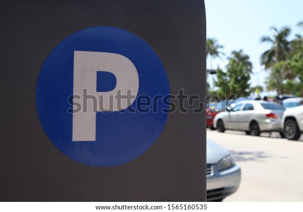 parking sign at the payment terminal. meters.\
authorized parking machine. Self service Machine parking pay on a\
city street.