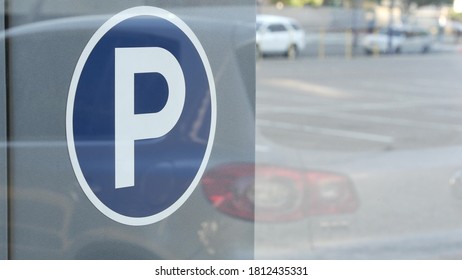 Parking Lot Sign As Symbol Of Traffic Difficulties And Transportation Issues In Busy Urban Areas Of USA. Public Paid Parking Zone In Downtown Of San Diego, California. Limited Space For Cars In City.