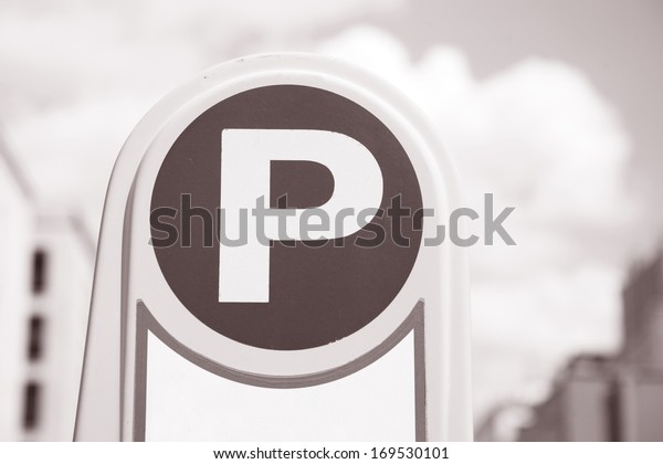 Parking Sign in Urban\
Setting