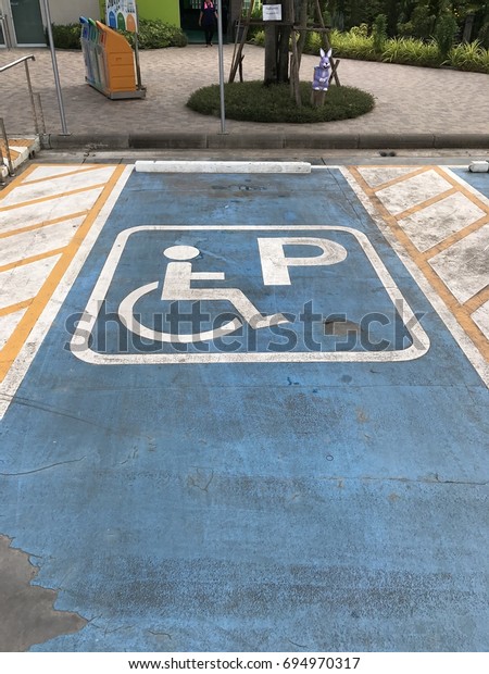 Parking signs, Symbol for\
the disabled