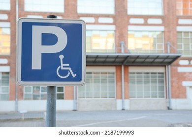 Parking Slot For Persons Using Wheelchair On The Area In Front Of Big Retail Building