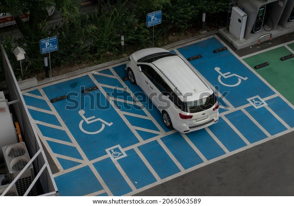 A parking space for the disabled in\
a parking lot in Korea. (Daegu, Korea. Sept. 9,\
2021)