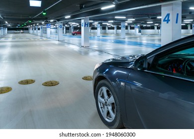 Parking space. Empty road asphalt background. Car lot parking space in underground city garage. Hidden underground carpark