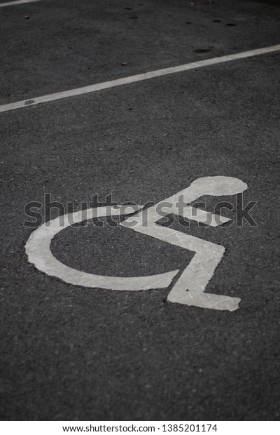 Parking lot with space\
for handicapped. 