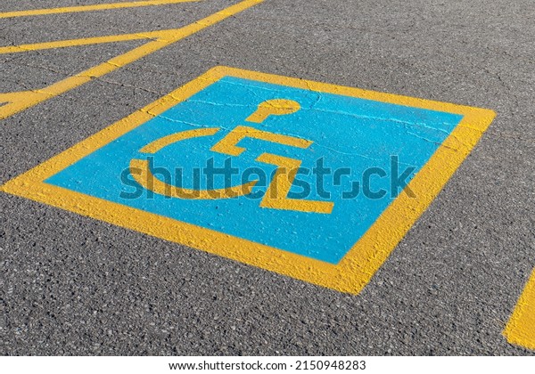 Parking space\
reserved for a handicapped\
people