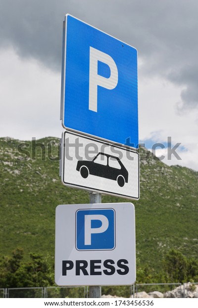 Parking space with a sign for journalists\
and media\
representatives