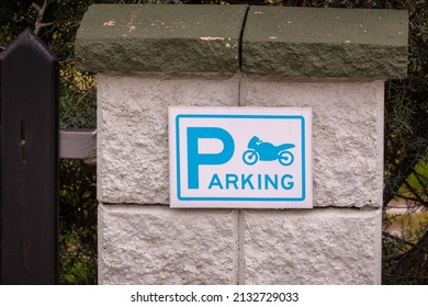 Parking Spot, Sign, For Motorcycles. Concrete Wall.