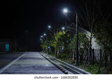 Parking Lot With Streetlight In Night.