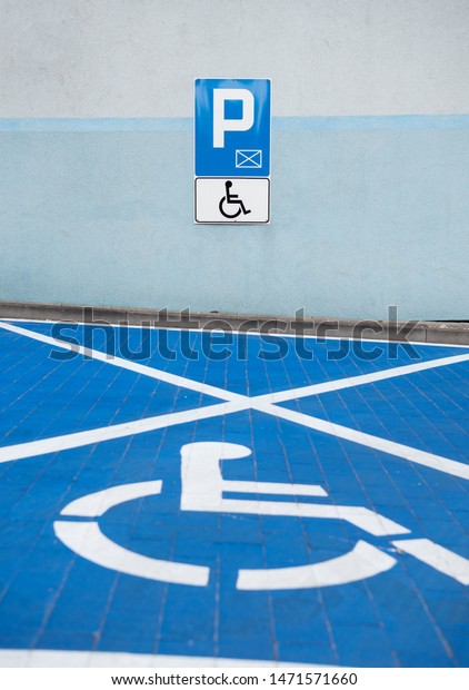Parking symbol\
for the disabled in the car park\
