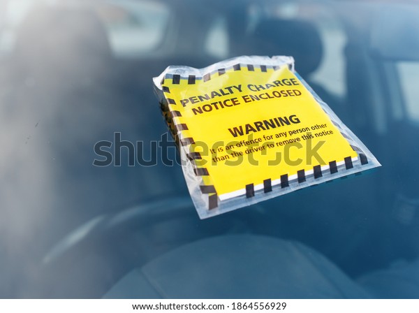 Parking ticket fine issued\
for parking violation while parking car in restricted no-parking\
zone 