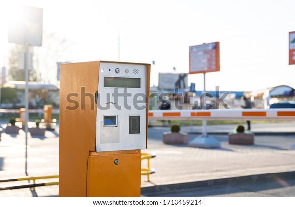 Parking\
tickets machine on a exit from a parking\
area.