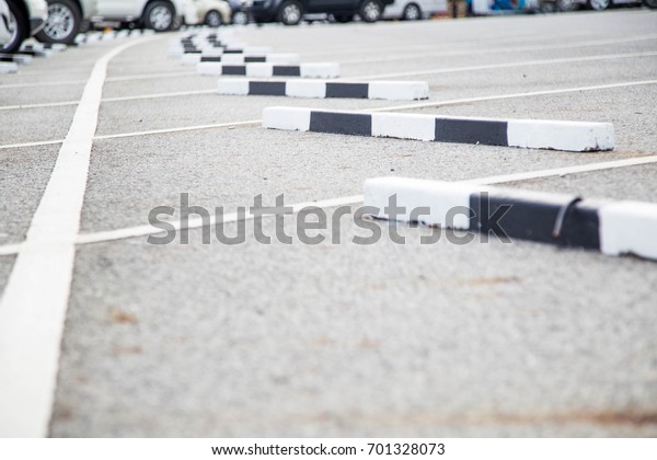 Parking lot with valet parking. The white line\
defines the foot.