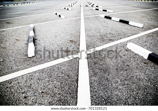 Parking lot with valet parking. The white line\
defines the foot.