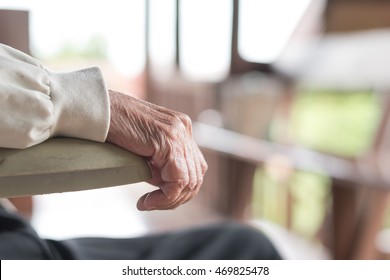 Parkinson Disease Patient, Or Alzheimer Elderly Senior Person In Support Of Nursing Family Caregiver For Disability Awareness Day Concept