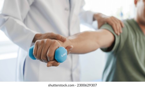 Parkinson's disease patients, hand pain, knee pain, arthritis, or taking care of your mental health with a senior doctor - Powered by Shutterstock