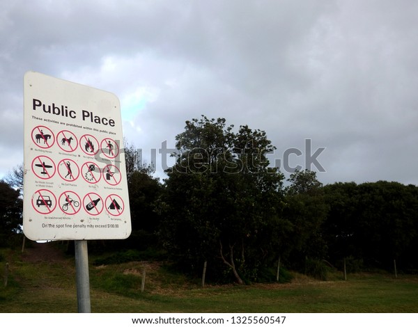 Parkland sign \
with rules and regulations\
symbols