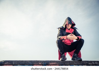 Parkour athlete - Free runner performing tricks in a urban settlement - Parkour,free running,youth,sport and lifestyle concept - Powered by Shutterstock