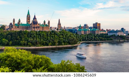 Parliament Hill and a Tour Boat on the Ottawa River in Summer
