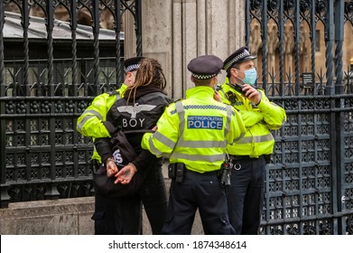 PARLIAMENT SQUARE, LONDON, ENGLAND- 14 December 2020: Police Arresting A Protester At An Anti-lockdown Protest Organised By The National Alliance For Freedom From Lockdowns