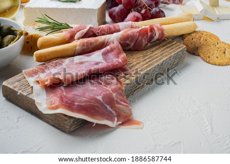 Similar – Image, Stock Photo Serrano ham on white background with copy space