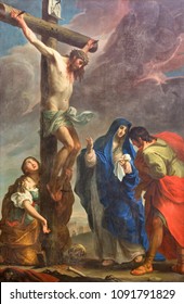 PARMA, ITALY - APRIL 16, 2018: The painting of Crucifixion in church Chiesa di San Antonio Abate by Giuseppe Peroni (1710 - 1776). 