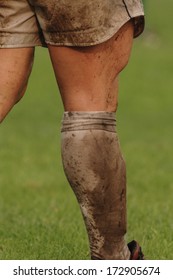 PARMA, ITALY - OCTOBER 12: Close Up Of Rugby Player Muddy Leg  During The Italian Rugby League Match Parma Vs Treviso, In Parma, October 12, 2005.