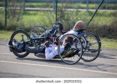 Parma, Italy - October 2020: Couple Of Disabled Athlete Training With Their Hand Bikes On A Track.