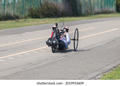 Parma, Italy - October 2020: Disabled Athlete Training With His Special Bike On A Track.