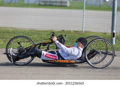 Parma, Italy - October 2020: Senior Athlete Training With His Hand Bike On A Track.