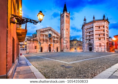 Parma, Italy - Piazza del Duomo with the Cathedral and Baptistery, built in 1059. Romanesque architecture in Emilia-Romagna.