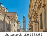 Parma, Italy, view of the Bell Tower of the San Giovanni Church with the side facade of the Cathedral on the left and  an ancient noble palace on the right
