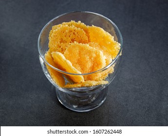 Parmesan Cheese Cracker Chips An A Glas Bowl Simple Easy Snack For Party Or Event On A Dark Stone Backgrond