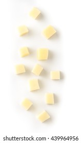 Parmesan Cheese Cubes On White Background. Top View.