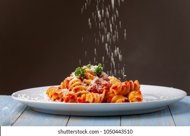 Parmesan Cheese Falling On Pasta 